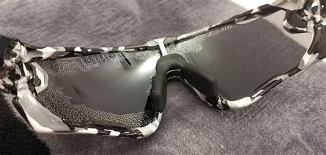 oakley lenses peeling